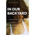 In Our Backyard: Human Trafficking in America and What We Can Do to Stop It - Paperback