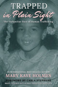 Trapped in Plain Sight: The Unfamiliar Face of Human Trafficking - Paperback